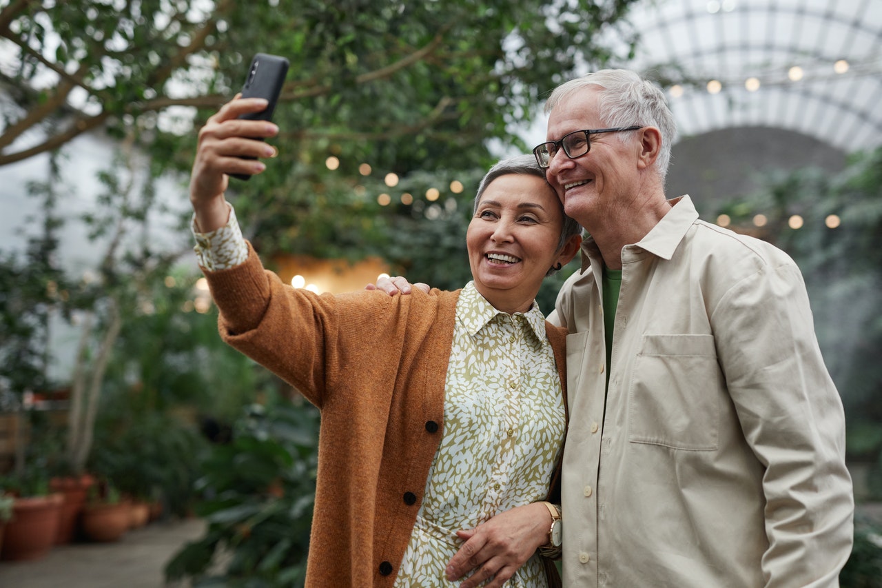 Older Couple Using Smartphone